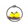 Couple d'oiseaux jaunes en résine sur balançoire en métal